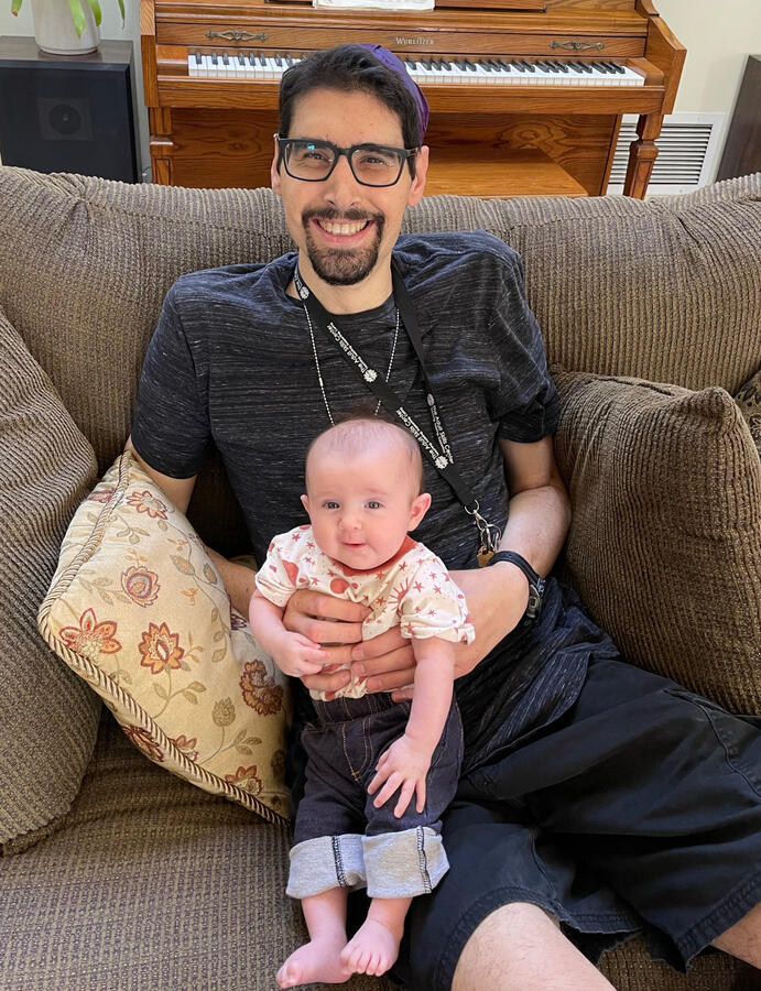 Nick holding Eva